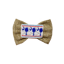 Load image into Gallery viewer, Palmetto on burlap Feltie Bow Tie made with Alligator hair clip, over the collar or elastic headband (2 sizes available)
